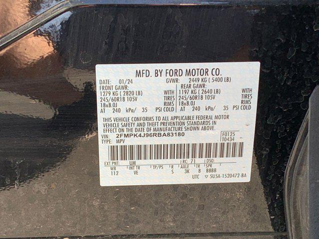 Photo of 2024 Agate Black Metallic Ford Edge