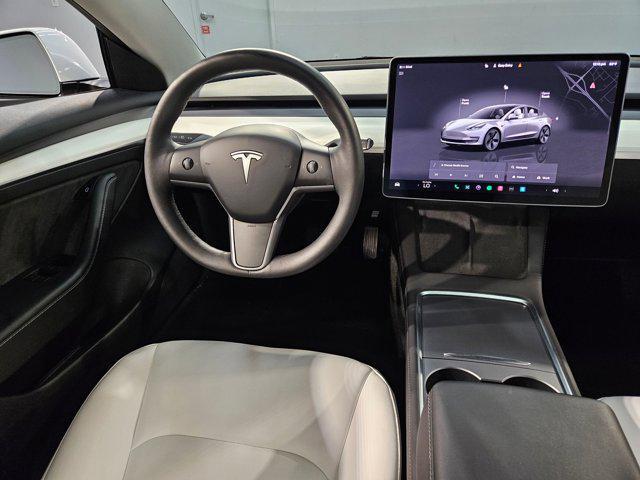 Photo of 2023 Pearl White Multi-Coat Tesla Model 3