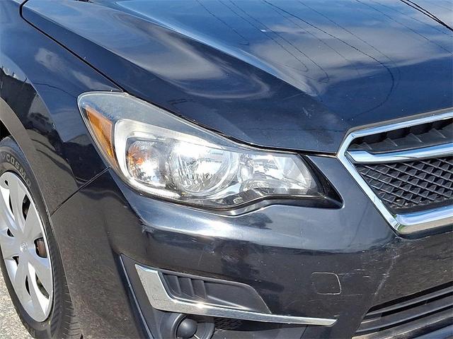 Photo of 2016 Crystal Black Silica Subaru Impreza