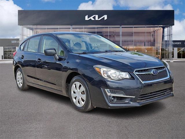 Photo of 2016 Crystal Black Silica Subaru Impreza