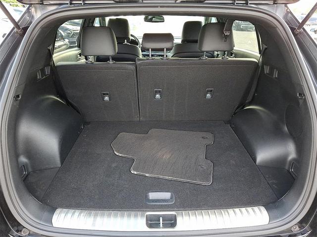 Photo of 2022 Black Cherry Pearl Kia Sportage