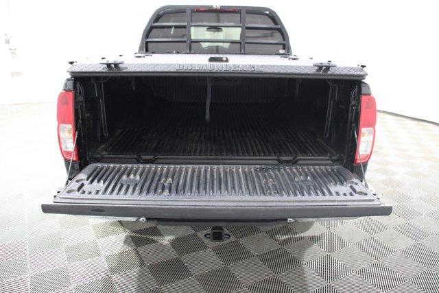 Photo of 2016 Magnetic Black Nissan Frontier