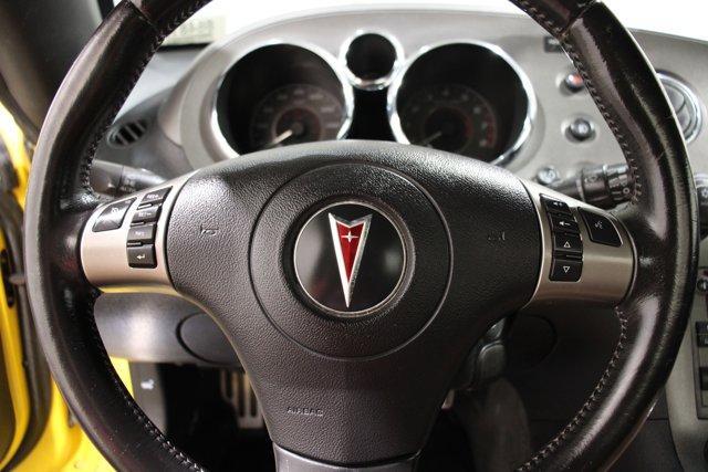 Photo of 2008 Mean Yellow Pontiac Solstice