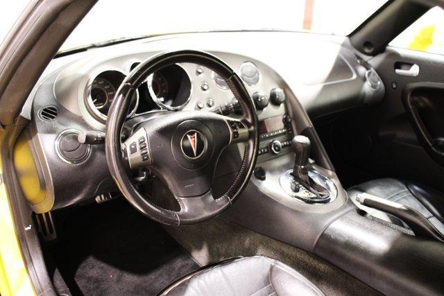 Photo of 2008 Mean Yellow Pontiac Solstice