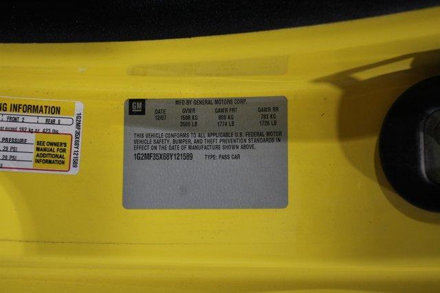 Photo of 2008 Mean Yellow Pontiac Solstice
