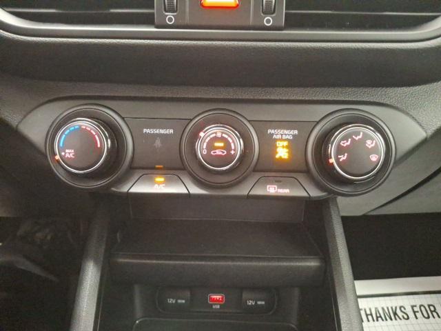 Photo of 2022 Fire Orange Kia Forte