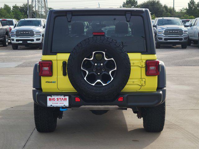 Photo of 2022 High Velocity Clearcoat Jeep Wrangler Unlimited 4xe