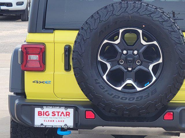 Photo of 2022 High Velocity Clearcoat Jeep Wrangler Unlimited 4xe