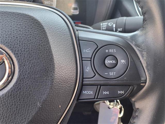 Photo of 2022 White w/Black Sand Pearl Roof Toyota Corolla