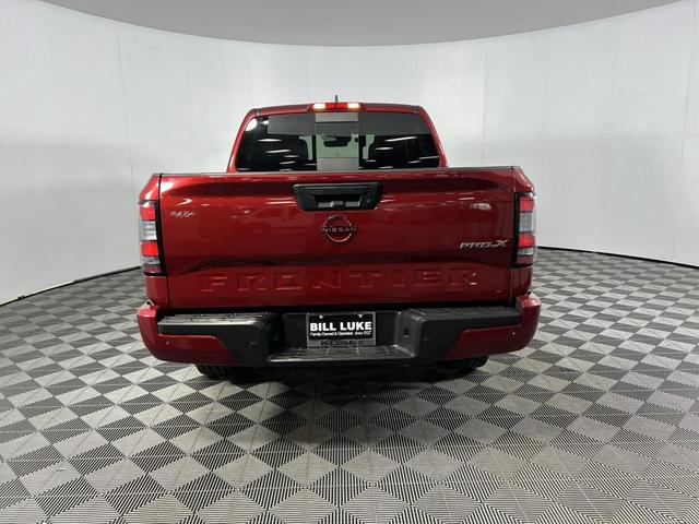Photo of 2023 Cardinal Red Metallic Tricoat Nissan Frontier