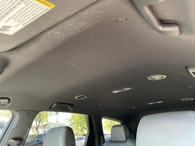 Photo of 2024 Cherry Red Tintcoat Buick Enclave