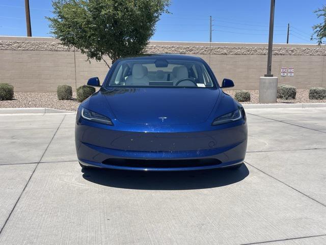 Photo of 2024 Deep Blue Metallic Tesla Model 3