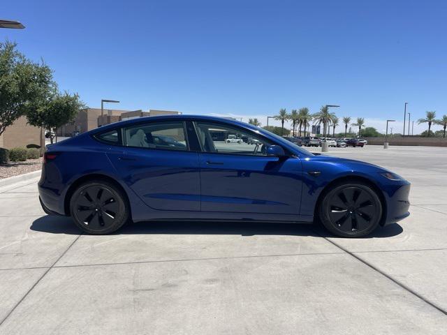 Photo of 2024 Deep Blue Metallic Tesla Model 3