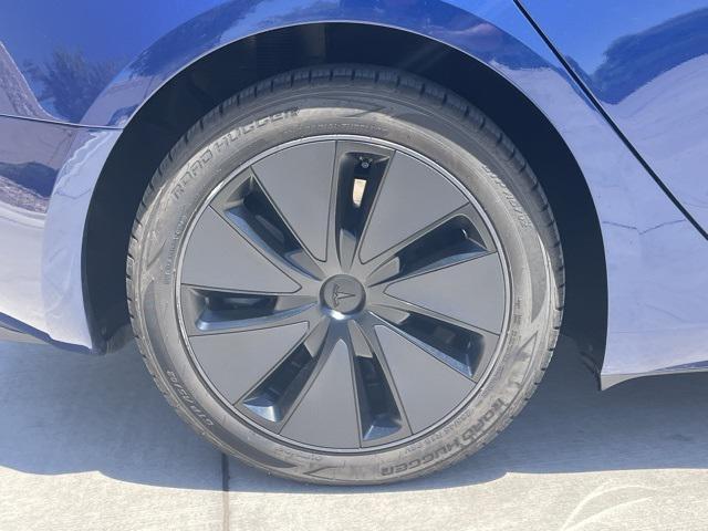 Photo of 2024 Deep Blue Metallic Tesla Model 3