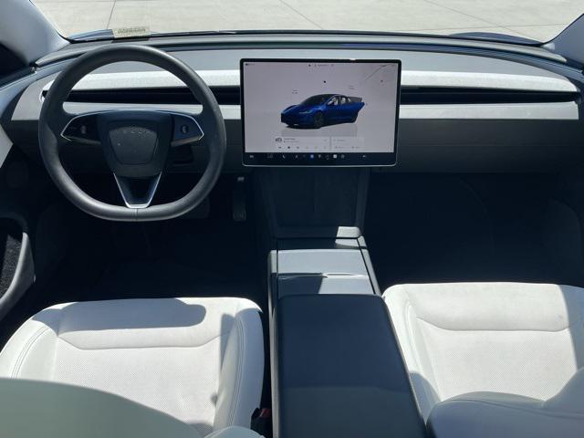 Photo of 2024 Deep Blue Metallic Tesla Model 3