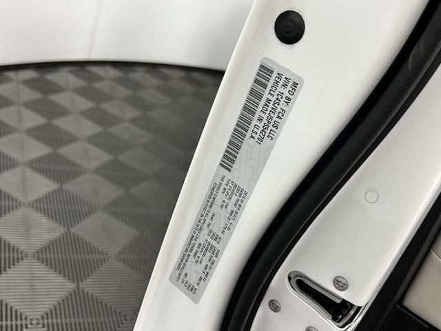 Photo of 2023 Bright White Clearcoat Jeep Grand Wagoneer
