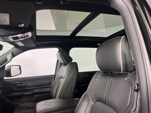 Photo of 2024 Diamond Black Crystal Pearlcoat RAM 1500
