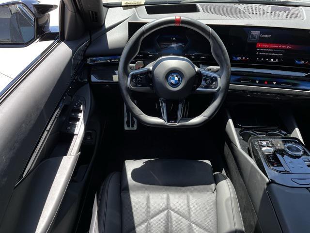 Photo of 2024 Black Sapphire Metallic BMW i5