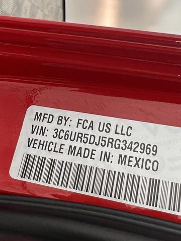 Photo of 2024 Flame Red Clearcoat RAM 2500
