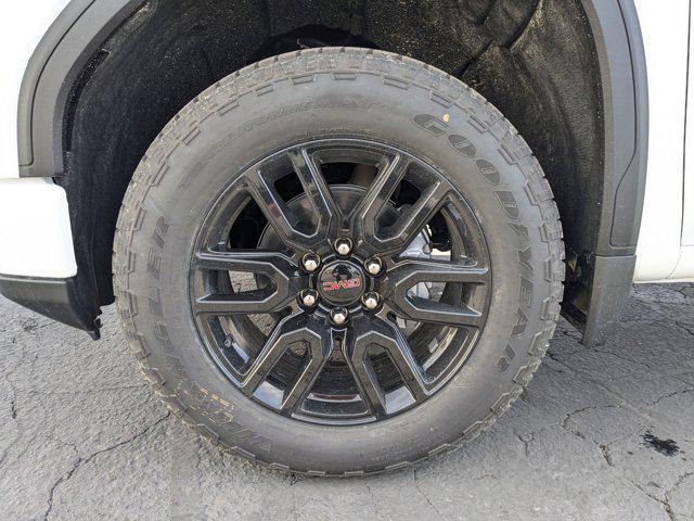 Photo of 2025 SUMMIT WHITE/JET BLACK GMC Sierra 1500
