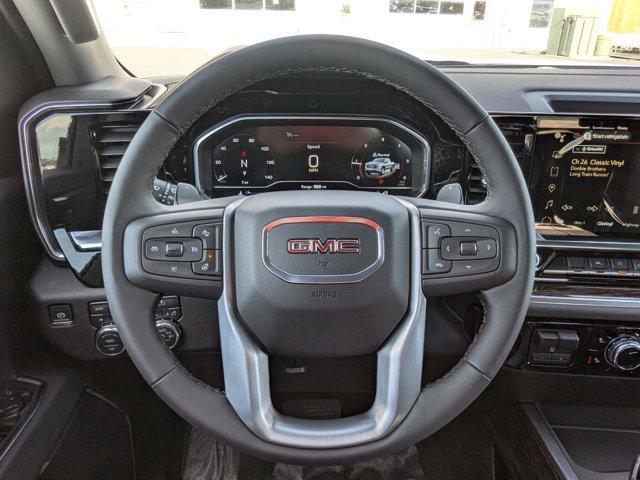 Photo of 2025 SUMMIT WHITE/JET BLACK GMC Sierra 1500