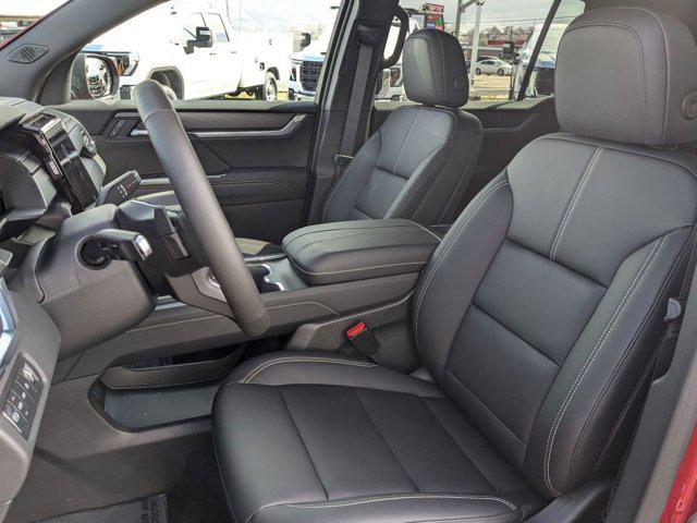Photo of 2025 Volcanic Red Tintcoat GMC Acadia