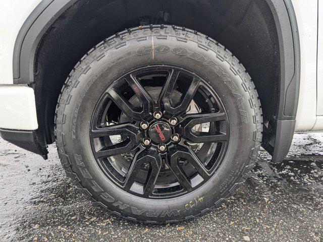Photo of 2025 SUMMIT WHITE/JET BLACK GMC Sierra 1500