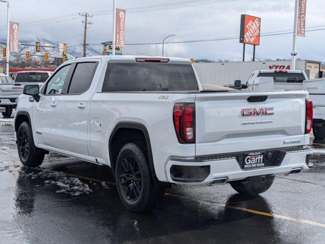 Photo of 2025 SUMMIT WHITE/JET BLACK GMC Sierra 1500