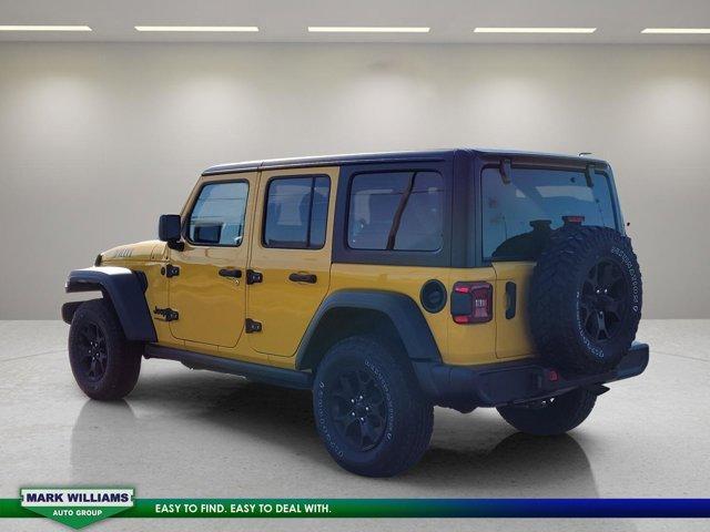 Photo of 2021 Baja Yellow Clearcoat Jeep Wrangler Unlimited