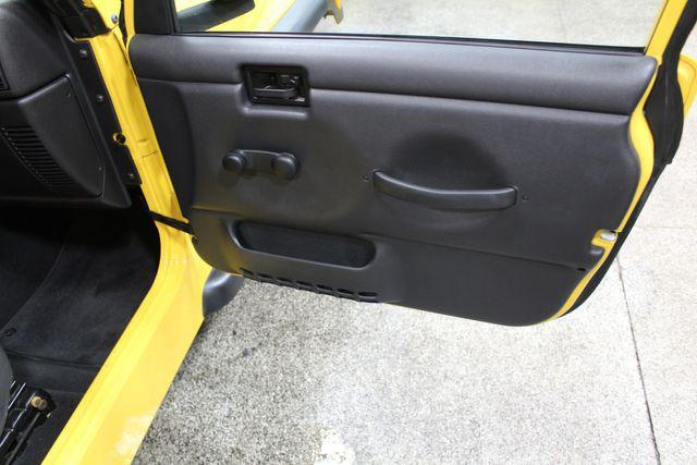 Photo of 2004 Solar Yellow Clearcoat/Black Hard Top Jeep Wrangler