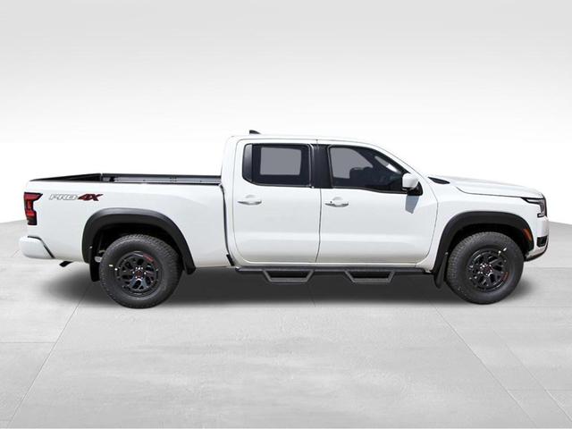 Photo of 2025 Glacier White Nissan Frontier