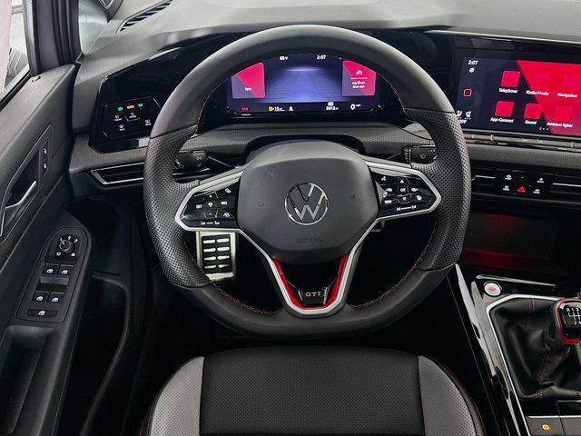 Photo of 2024 Moonstone Gray/Black Roof Volkswagen Golf GTI