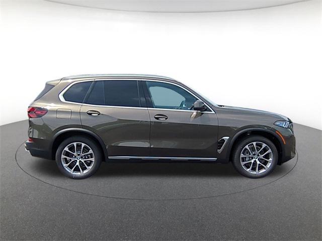 Photo of 2026 Green Metallic BMW X5