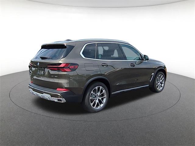 Photo of 2026 Green Metallic BMW X5