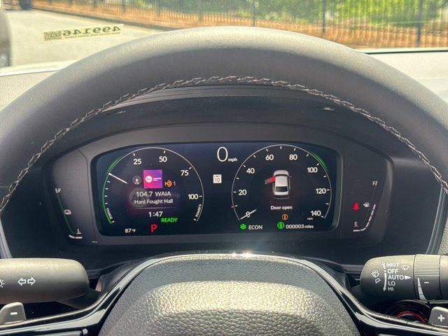 Photo of 2025 Platinum White Pearl Honda Civic Hybrid