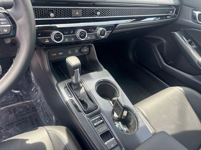 Photo of 2025 Platinum White Pearl Honda Civic Hybrid