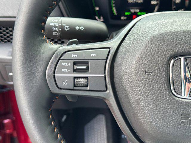 Photo of 2026 Radiant Red Metallic Honda CR-V Hybrid