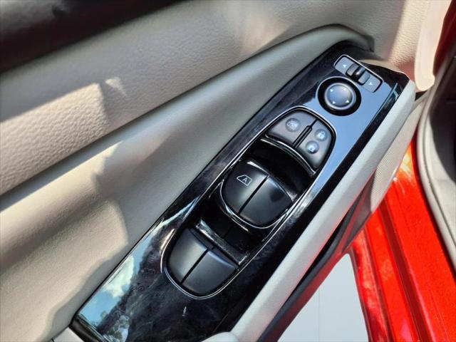 Photo of 2023 Garnet Pearl Nissan Altima