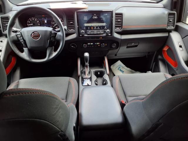 Photo of 2023 Glacier White Nissan Frontier