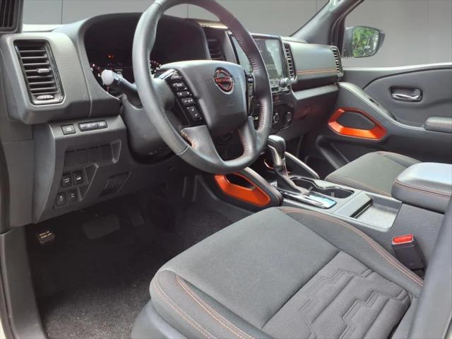 Photo of 2023 Glacier White Nissan Frontier