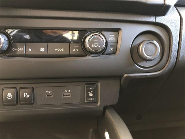 Photo of 2025 Glacier White Nissan Frontier