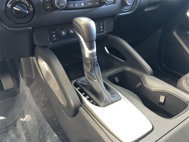 Photo of 2025 Glacier White Nissan Frontier
