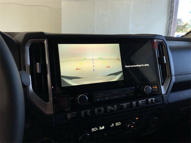 Photo of 2025 Glacier White Nissan Frontier