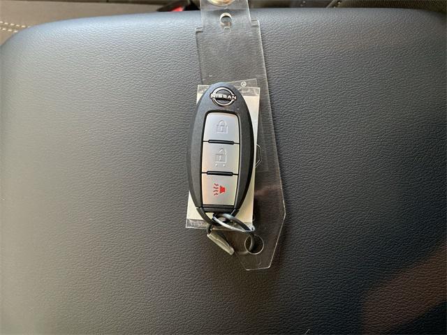 Photo of 2025 Glacier White Nissan Frontier