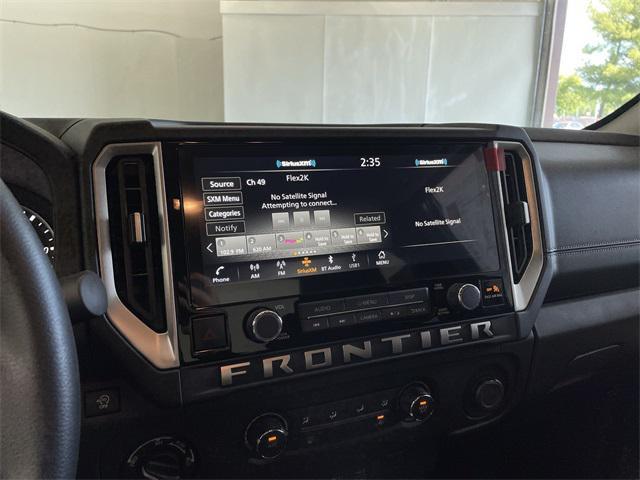 Photo of 2025 Glacier White Nissan Frontier