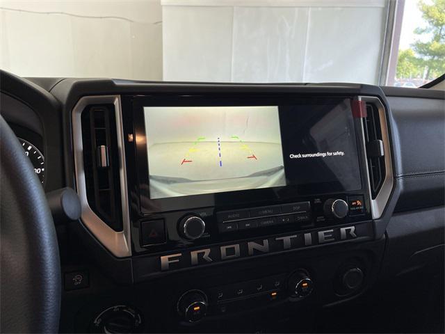 Photo of 2025 Glacier White Nissan Frontier
