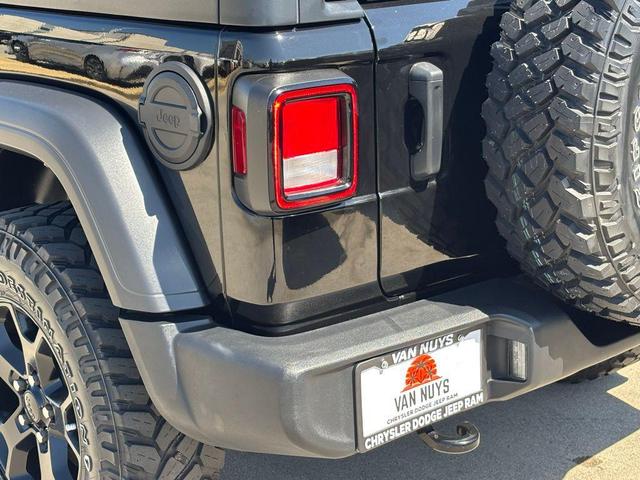 Photo of 2021 Black Clearcoat Jeep Wrangler