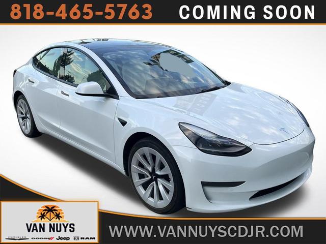 Photo of 2022 Pearl White Multi-Coat Tesla Model 3