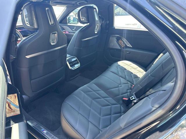 Photo of 2024 Carbon Black Metallic BMW 740