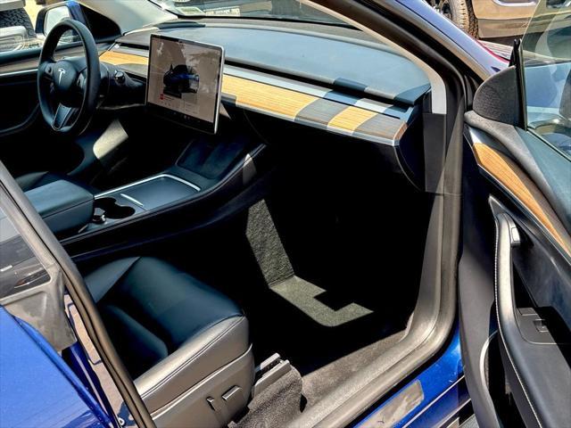 Photo of 2023 Deep Blue Metallic Tesla Model Y